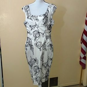 Cream colored dress with black design size 16